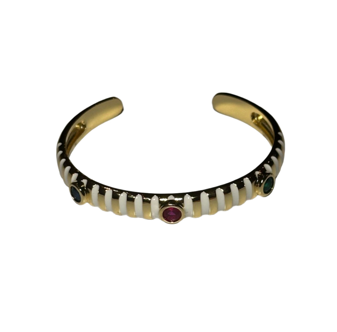 Pulsera estilo Bangle con lineas de blancas