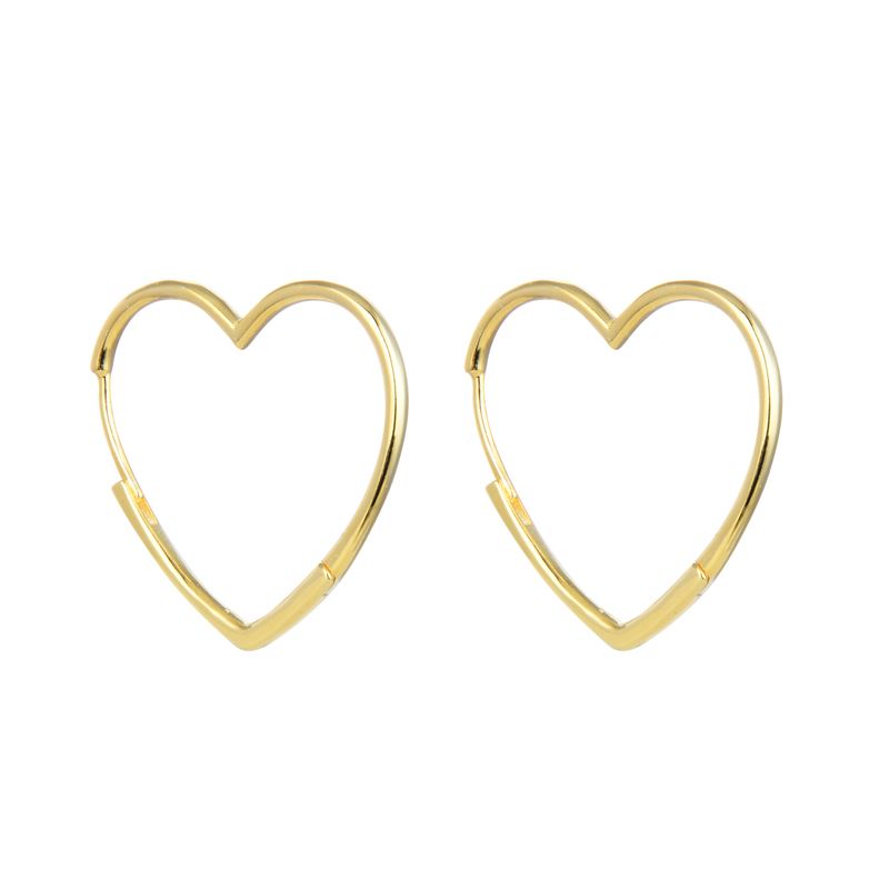 Argollas de plata, bañadas en oro en forma de corazón