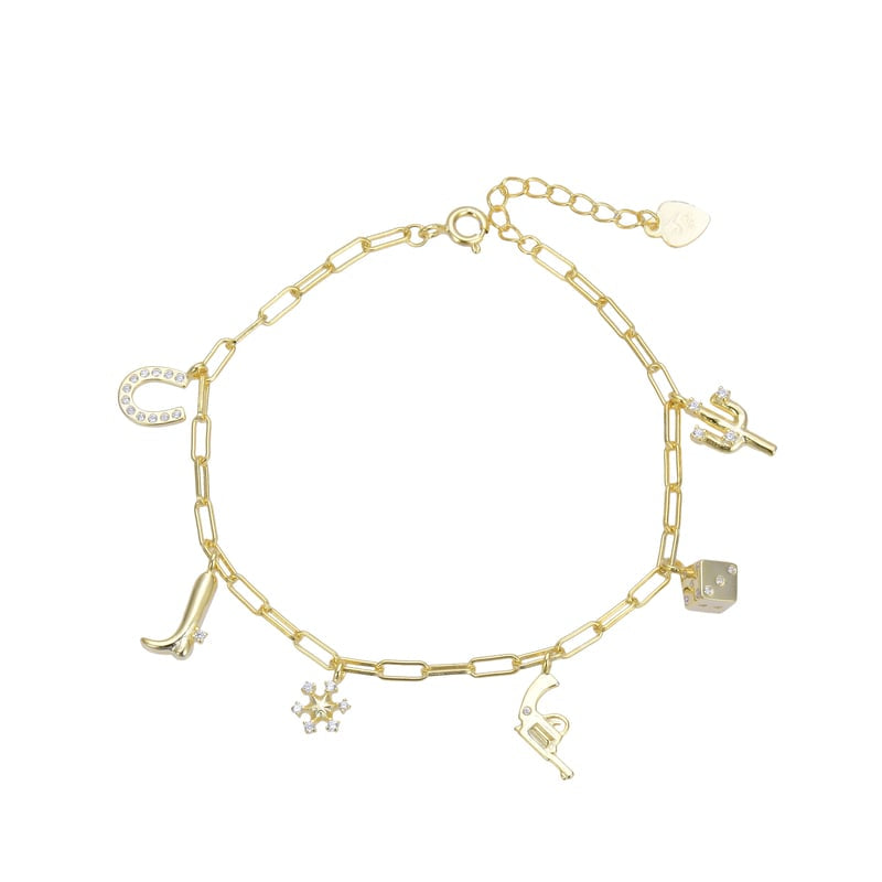 Pulsera de plata bañada en oro amarillo con dijes