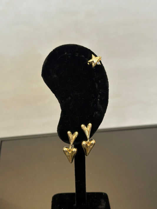 Ear cuff de estrella bañado en oro