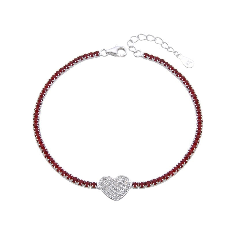 Pulsera de tennis roja con dije de corazon plateado en centro de plata