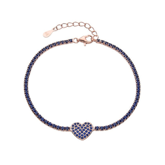 Pulsera estilo tennis con circones azules y dije de corazon en centro de plata bañada en oro rosado