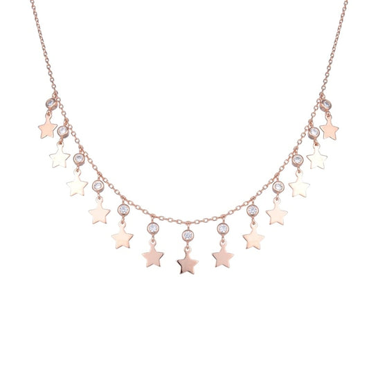 Collar de plata bañada en oro rosado con dijes de cristales y estrellas guindando