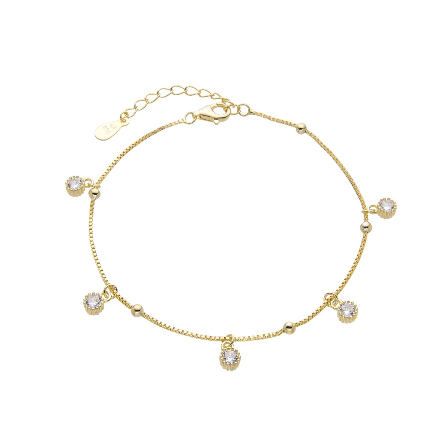 Pulsera de plata bañada en oro amarillo con dijes de circones como brillantes