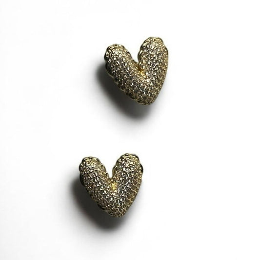 Aretes bañados en oro con circones en pave