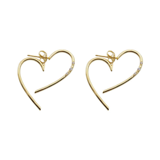 Aretes de plata, bañados en oro, tipo argollas en forma de corazón