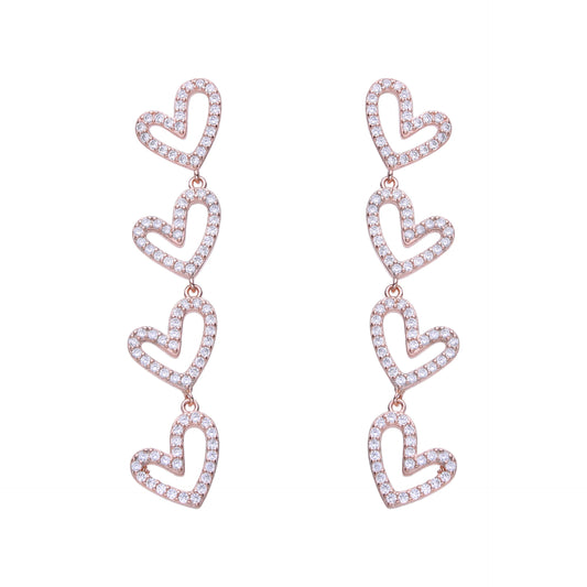 Aretes largos de corazones en bañados en rose gold