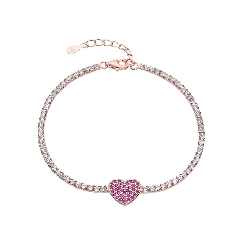 Pulsera estilo tennis con dije de corazon rosado en centro de plata bañada en oro rosado