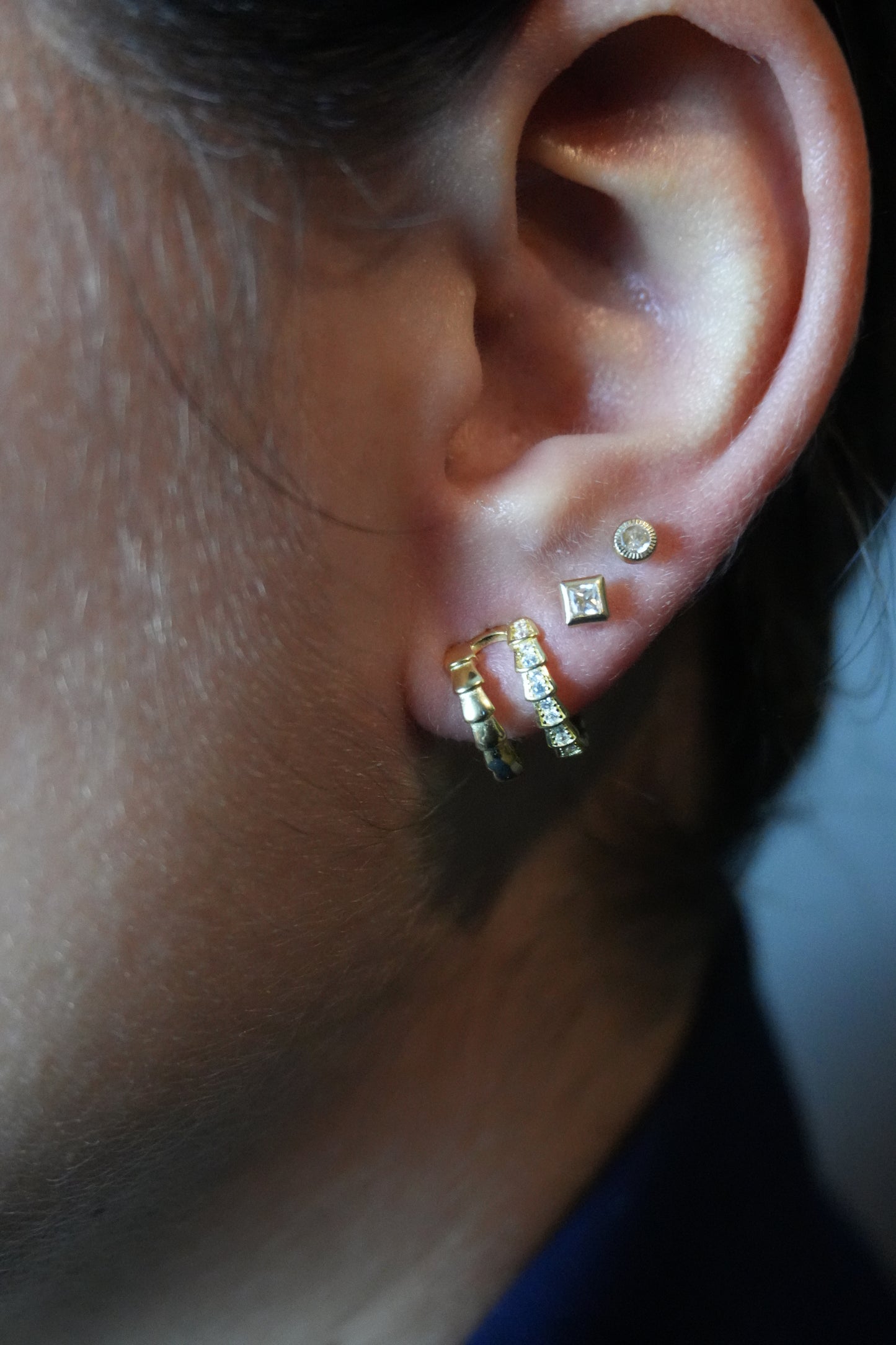 Medias argollas de plata, bañadas en oro