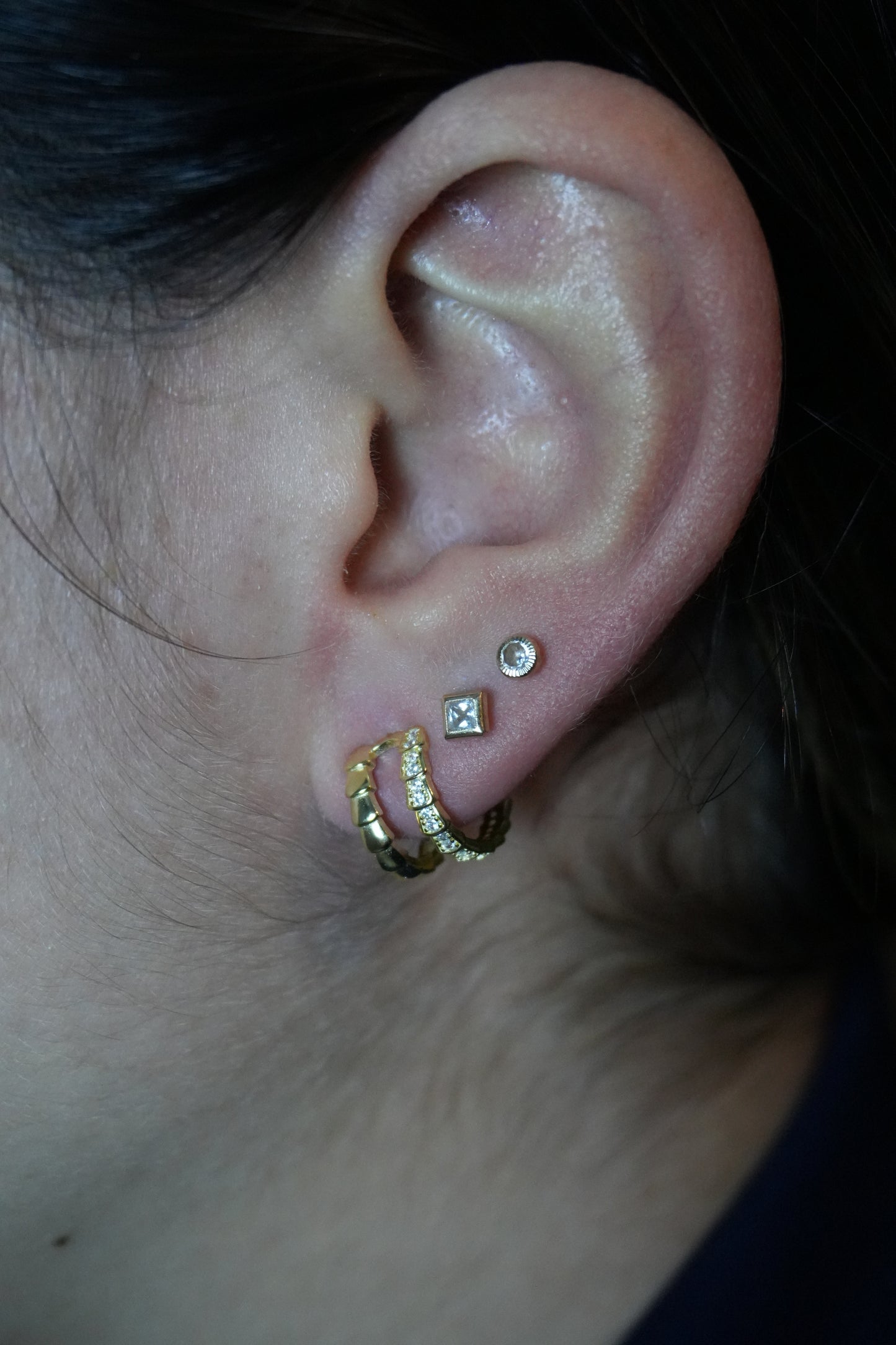 Medias argollas de plata, bañadas en oro