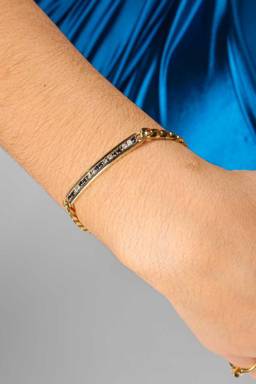 Pulsera de oro de 18k estilo esclava con brillantes y safiros naturales