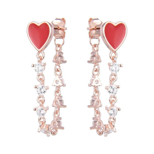 Studs de plata bañados en rose gold con piedreria y corazones rojos
