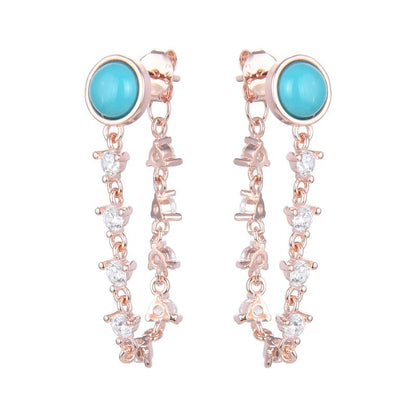 Studs de plata bañados en rose gold con piedreria y puntos tipo turquezas