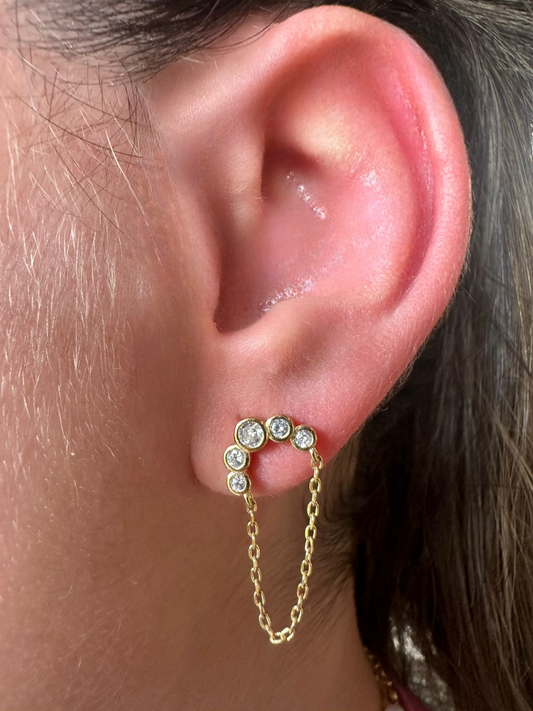 Aretes de plata bañados en oro amarillo y circones