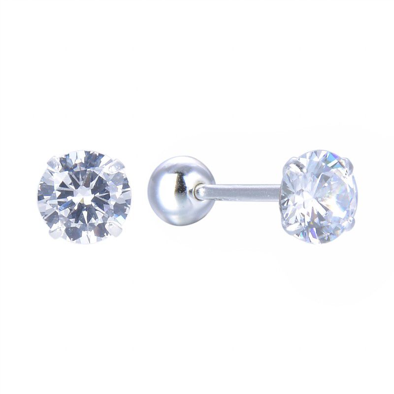 Silver and zirconia stud earrings.